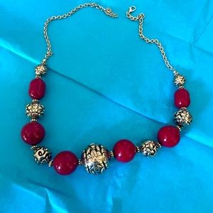 Red and silver colored necklace